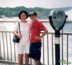 Chaizu with her son Dalai at the Niagara Falls; Brian photographed them.